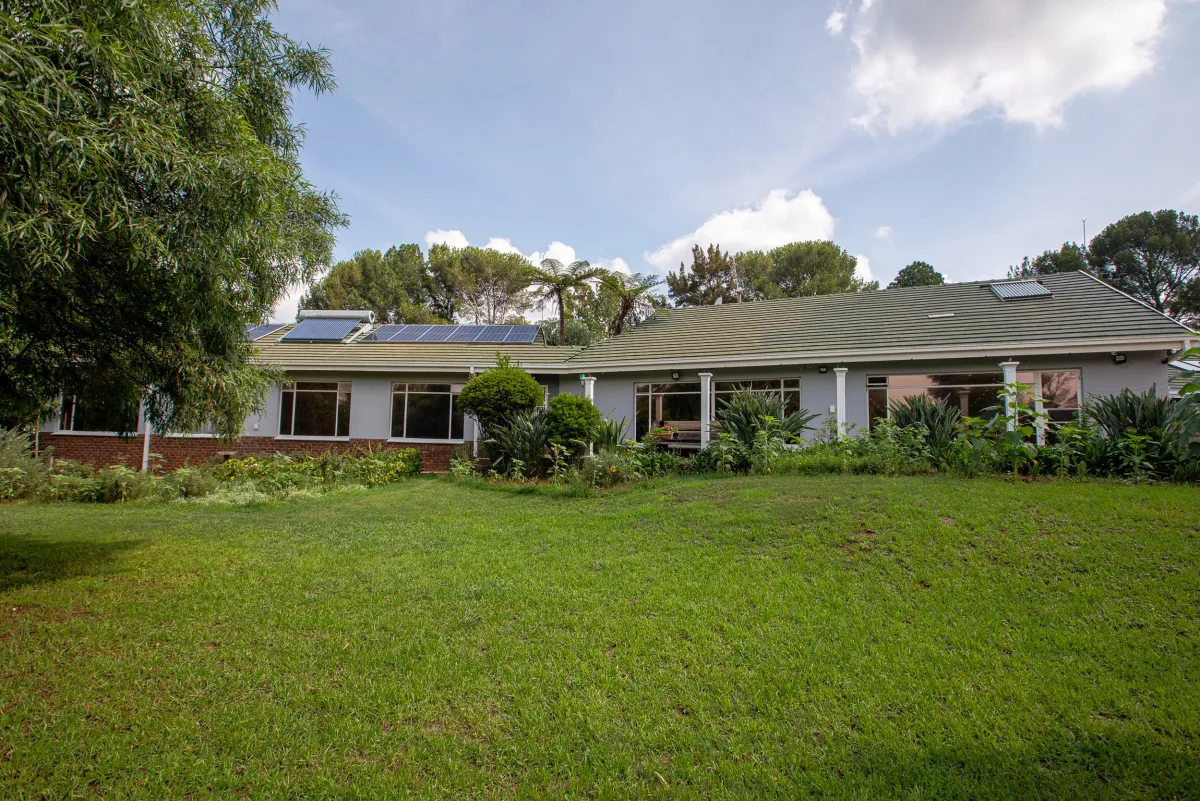 Lush garden and lawn at Eikenhof Country Guesthouse